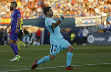 Luis Suarez hit a double to stretch Barca's La Liga lead