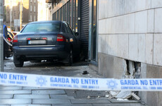 Occupants of car flee scene after crashing into government office building