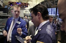 Apple shares hit record high of $600