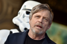 Mark Hamill is scarlet over footage of him wearing a gold jumpsuit and singing in German