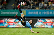 Suarez reaches international landmark as Cavani scores stunning overhead kick