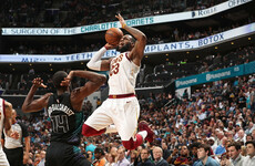 James ties Michael Jordan's double-digit scoring record as Cavs down Hornets