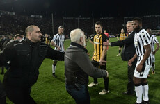 Greek owner who invaded pitch with gun handed three-year ban