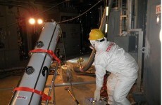 Examination reveals very high radiation, little water in Japan reactor