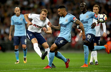 Harry Kane gets 39th goal of the season as Tottenham secure Champions League football