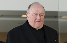 Australian archbishop steps down after being found guilty of covering up child sex abuse