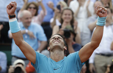 'King of Clay' Nadal clinches 11th French Open title despite injury scare