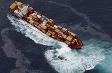 New Zealand charges owner of grounded ship