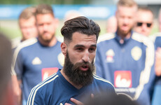 Sweden's Sports Minister wears football jersey to parliament after World Cup player suffers racial attacks
