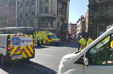 Collision between coach and pedestrian on Dublin's Dame Street causes traffic delays in city