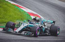 Bottas clocks track record lap to secure pole position in Austria