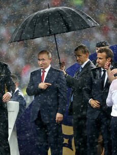 'In Mother Russia only Putin gets an umbrella' - Viewers bemused by President's World Cup 'power move'