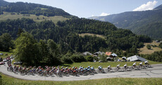 Sky's Geraint Thomas soars to 11th stage and into Tour's yellow jersey