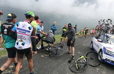 Froome knocked off his bike by French policeman who mistakes him for fan