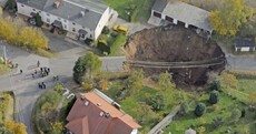 Slideshow: Huge sinkhole opens suddenly in German town