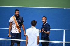 Federer, Djokovic through as storm rages over umpire's Kyrgios pep-talk