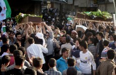 Activists: Syrian troops attack Damascus suburb