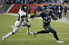 Henry equals record with 99-yard TD, scores three more as Titans trounce Jags