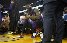 LeBron James injured in Lakers Christmas Day rout of defending champion Warriors