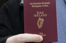 Tánaiste says TDs using their offices for passport deliveries is 'unhelpful'