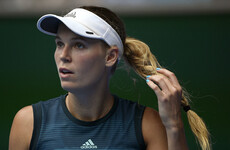 Federer and Wozniacki stay on track as other top players crash out