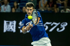 Djokovic survives scare to advance to Australian Open quarter-finals