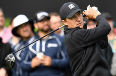 Spieth in tie for lead in California as Woods and McIlroy wait to start after play suspended