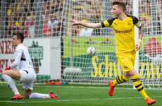 Reus fires Dortmund to victory to keep the heat on Bayern in Bundesliga title race
