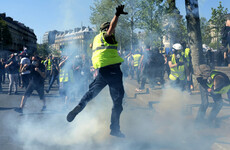 Emmanuel Macron says yellow vest violence must stop as he offers 'significant' tax cuts