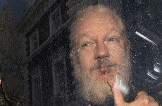 Julian Assange sentenced to 50 weeks in jail for breaching bail in UK