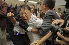 Photos: Anarchy in Hong Kong parliament as politicians scuffle over extradition row
