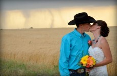 VIDEO: Couple tie the knot... as 250kph tornado drops behind them