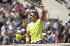 Defending champ Nadal opens record-extending Roland Garros bid positively as Wozniacki crashes out