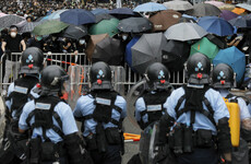 Police fire tear gas at Hong Kong protesters amid clashes over extradition plans