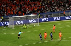 Penalty drama sends European champions into World Cup quarter-finals