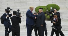 'It's a great day for the world': Trump invites Kim to US after symbolic 'handshake of peace'