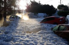 Cars buried and homes damaged after freak hail storm strikes Mexican city