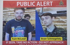 Armed police and tracker dogs search for missing teen murder suspects in remote Canadian forest