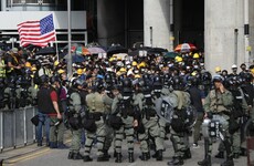 Riot police fire tear gas at Hong Kong protesters defying police ban