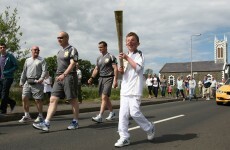 Olympic torch spotlights Northern Ireland coast