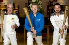 Olympic flame braves stormy seas, departs Ireland