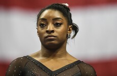 Brother of gymnast Simone Biles charged over triple murder in US