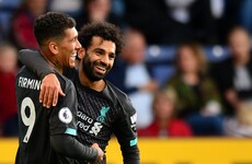 Liverpool stroll to record-breaking win against Burnley