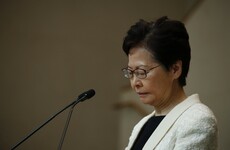 Hong Kong leader vows to stay on despite leaked recording