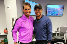 Nadal books quarter-final spot while 'idol' Tiger Woods watches from the stands