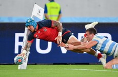 Efficient England seal quarter-final spot with win over 14-man Argentina