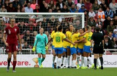 Debinha brace silences record crowd as Neville's England beaten again