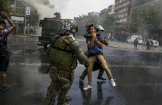 Violence in Chile sparked by metro fare hike has left three dead