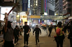 Five wounded as knife attack caps day of Hong Kong political chaos