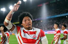 Rugby fans mob Japan's Brave Blossoms at victory parade